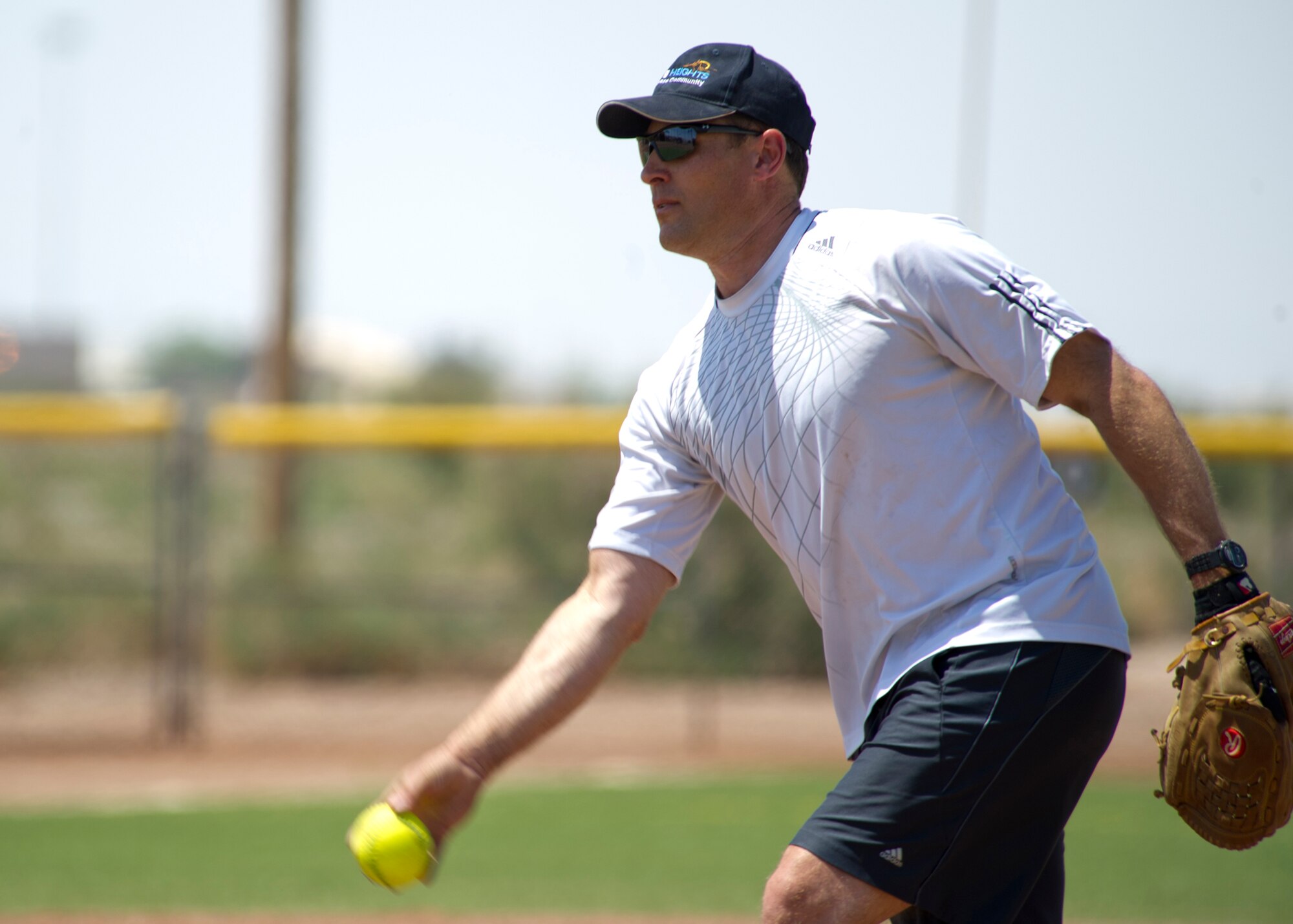 HOLLOMAN AIR FORCE BASE, N.M. – Col. David Krumm, the 49th Wing Commanders pitches during the first inning of the Chiefs versus Commanders softball game on May 6, 2011. The game is part of the wing’s annual spring fling and included a resiliency briefing, dodge ball, basketball, go-karts, a burger burn and other activities and to give Team Holloman a chance to relax after earning an “Excellent” rating during Holloman’s recent Operational Readiness Inspection. (U.S. Air Force photo by Senior Airman Veronica Stamps/Released)