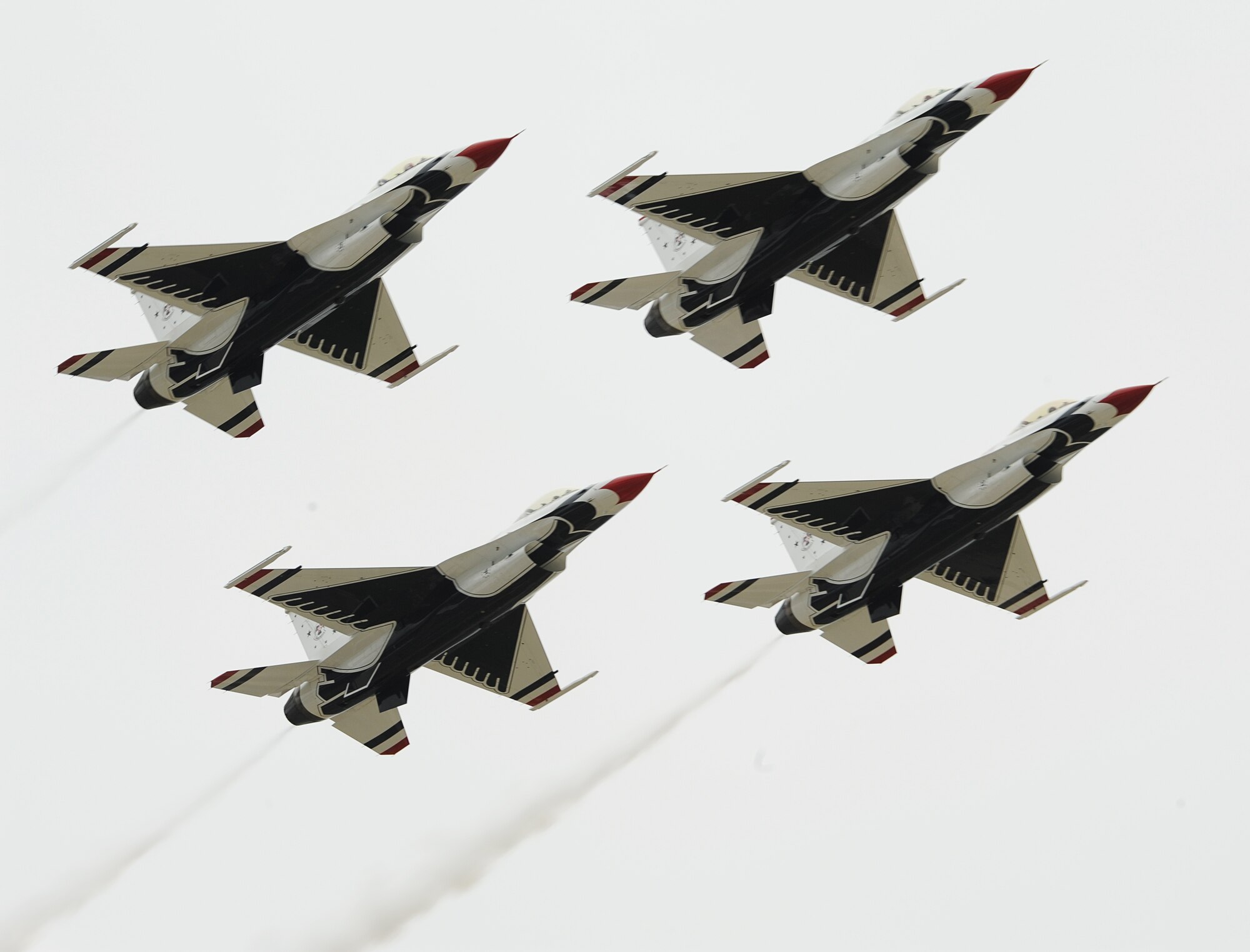 The U.S. Air Force Air Demonstration Squadron, the Thunderbirds, F-16 Fighting Falcons fly in a diamond formation during an aerial demonstration at Langley Air Force Base, Va., May 13, 2011. The Thunderbirds display the most advanced airpower and support capabilities in the world. (U.S. Air Force photo/Airman 1st Class Teresa Zimmerman)(RELEASED)
