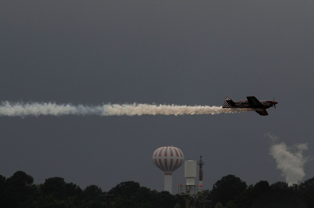 Pilot Greg Poe zips over the airfield at Langley Air Force Base, Va., May 13, 2011. Joint Base Langley-Eustis’ Air Power over Hampton Roads open house provides a venue in which the public can see modern and historical military aircraft in action. (U.S. Air Force photo by Airman 1st Class Racheal Watson)(RELEASED)
