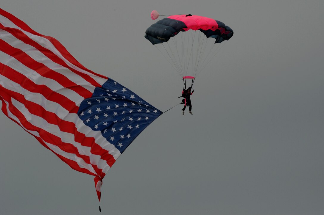 Cindy Irish, Misty Blues All-Women Skydiving Team leader, sails over Langley Air Force Base, Va., May 13, 2011. The Joint Base Langley-Eustis open house is a free three-day event featuring aerial demonstrations by modern and historical aircraft and civilian performers. (U.S. Air Force photo by Airman 1st Class Racheal Watson)(RELEASED)