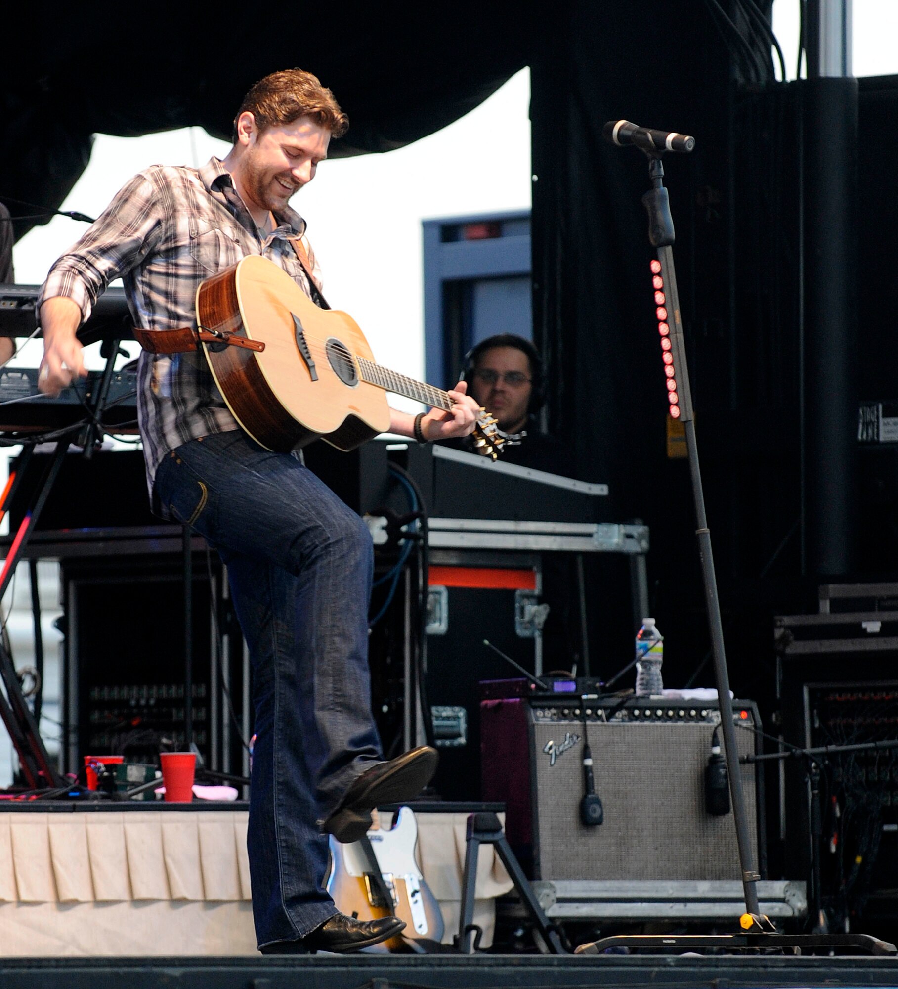 Country Singer Chris Young performs hit songs during the AirPower Over Hampton Roads open house at Langley Air Force Base, Va., May 13, 2011. The open house kicked off with the free concert as a part of the Airpower After Dark, followed by aerial demonstrations and fireworks. (U.S. Air Force photo/Staff Sgt. Dana Hill)(RELEASED)