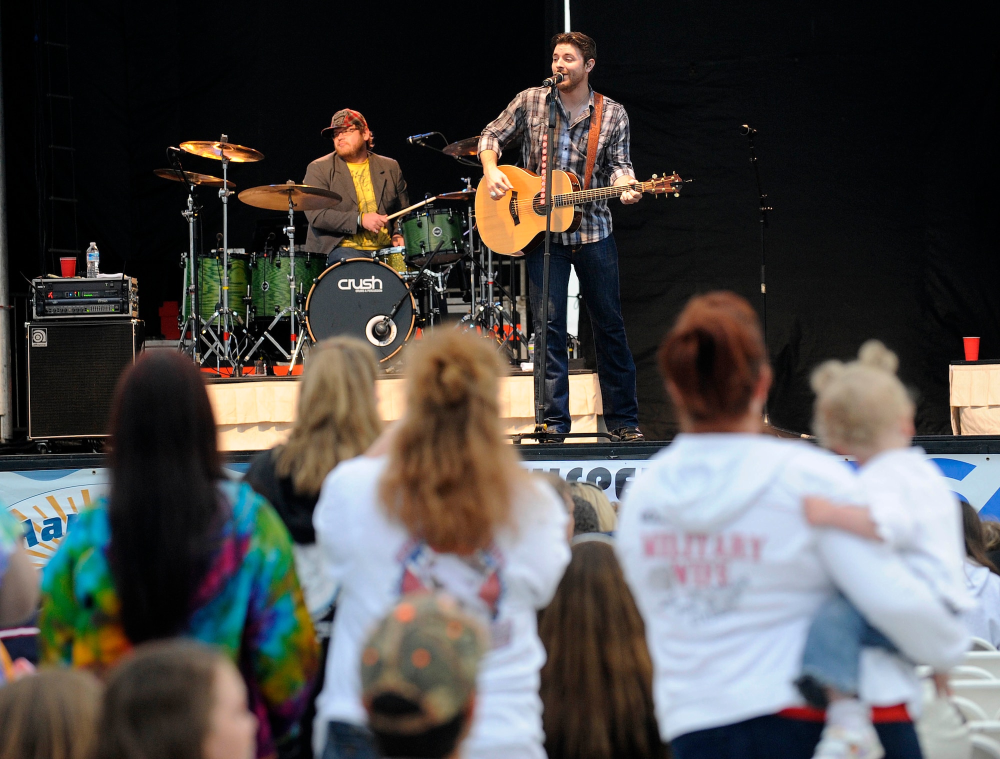 Country Singer Chris Young performs hit songs during the AirPower Over Hampton Roads open house at Langley Air Force Base, Va., May 13, 2011. The open house kicked off with the free concert as a part of the Airpower After Dark, followed by aerial demonstrations and fireworks. (U.S. Air Force photo/Staff Sgt. Dana Hill)(RELEASED)