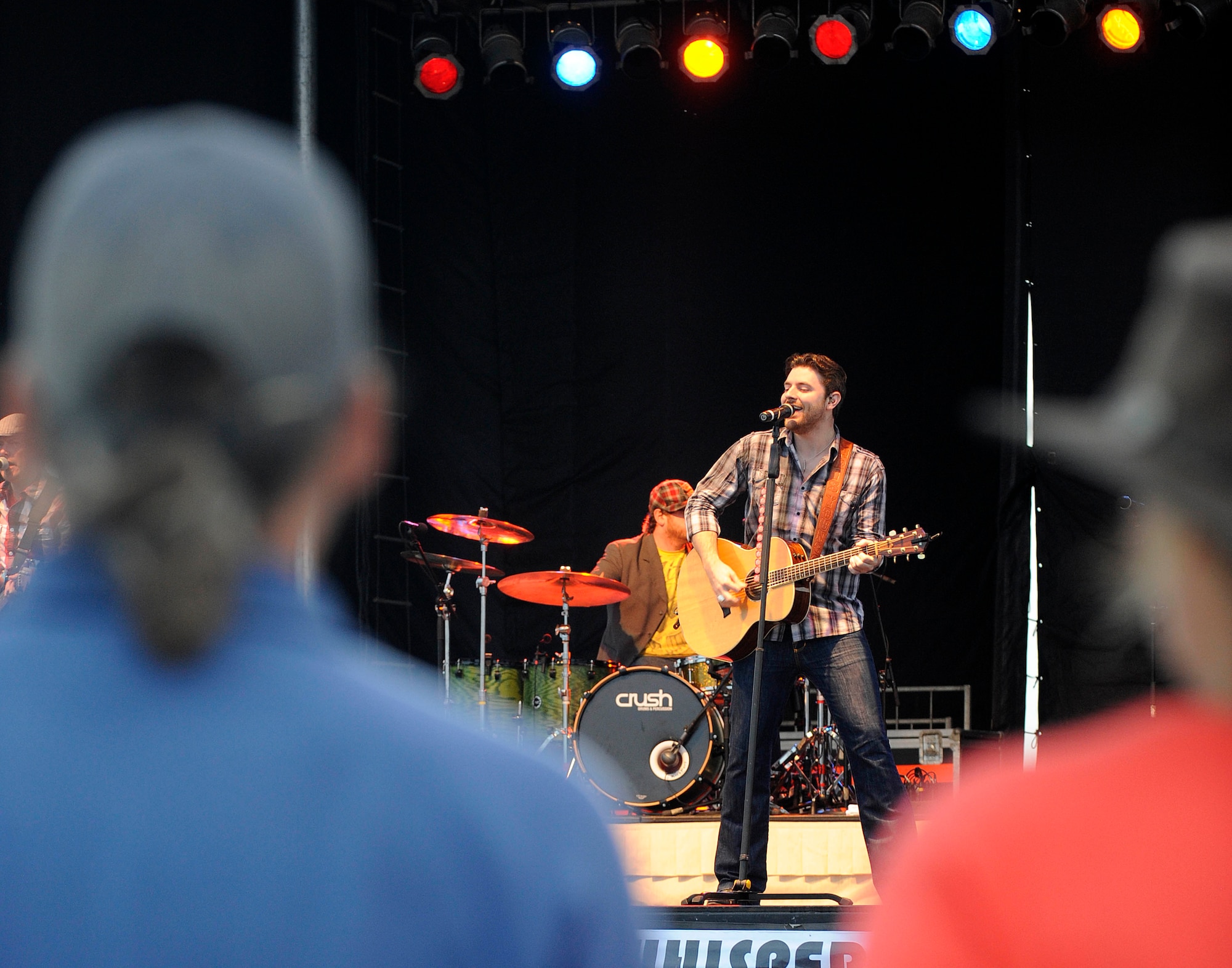 Country Singer Chris Young performs hit songs during the AirPower Over Hampton Roads open house at Langley Air Force Base, Va., May 13, 2011. The open house kicked off with the free concert as a part of the Airpower After Dark, followed by aerial demonstrations and fireworks. (U.S. Air Force photo/Staff Sgt. Dana Hill)(RELEASED)