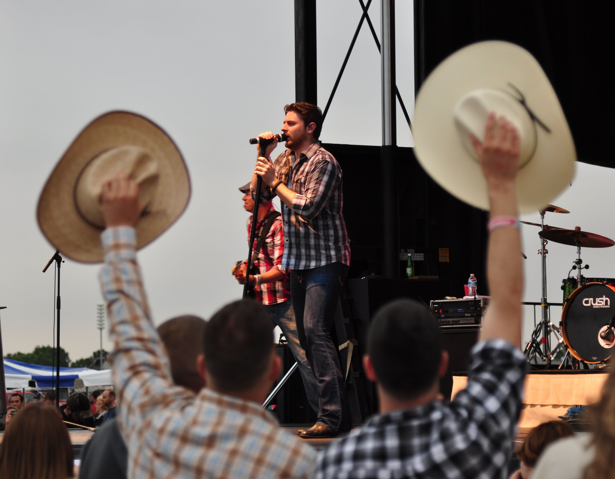 Chris Young, country singer, provides a free live concert for thousands at Langley Air Force Base, Va., May 13, 2011. The AirPower over Hampton Roads concert kicked off a night of fireworks and aerial demonstrations. (U.S. Air Force photo/Senior Airman Jonathan Muller)(RELEASED)