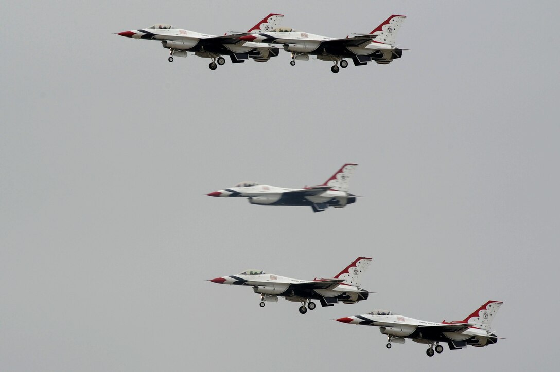 The U.S. Air Force Demonstration Squadron, the Thunderbirds, showcase close aerial synchronization at Langley Air Force Base, Va., May 13, 2011. The U.S. Air Force Thunderbirds display the most advanced airpower and support capabilities in the world at Airpower over Hampton Roads. (U.S. Air Force photo by Airman 1st Class Kayla Newman)(RELEASED)
