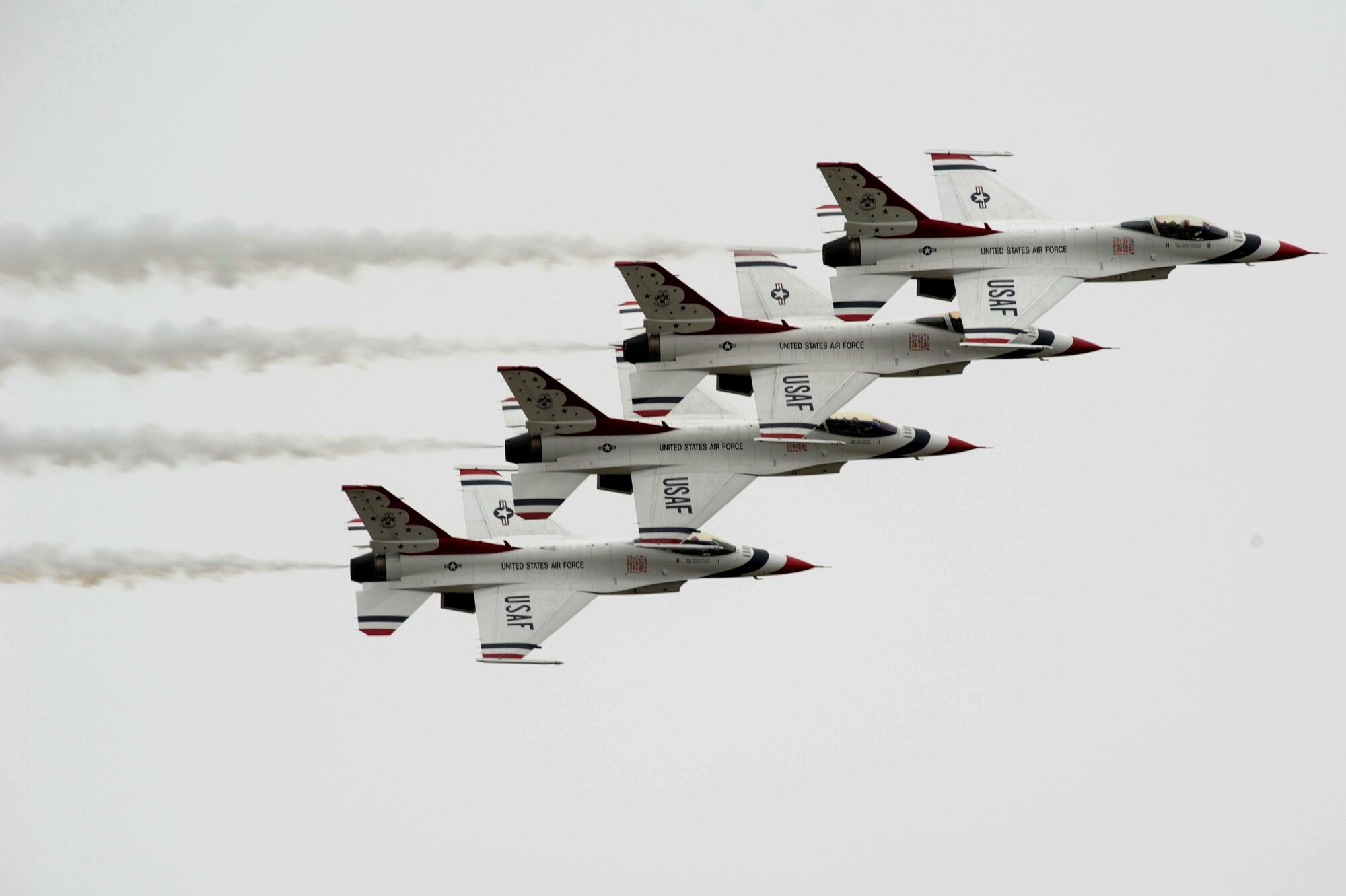 The U.S. Air Force Demonstration Squadron, the Thunderbirds, showcase close aerial synchronization at Langley Air Force Base, Va., May 13, 2011. The U.S. Air Force Thunderbirds display the most advanced airpower and support capabilities in the world at Airpower over Hampton Roads. (U.S. Air Force photo by Airman 1st Class Kayla Newman)(RELEASED)RELEASED)