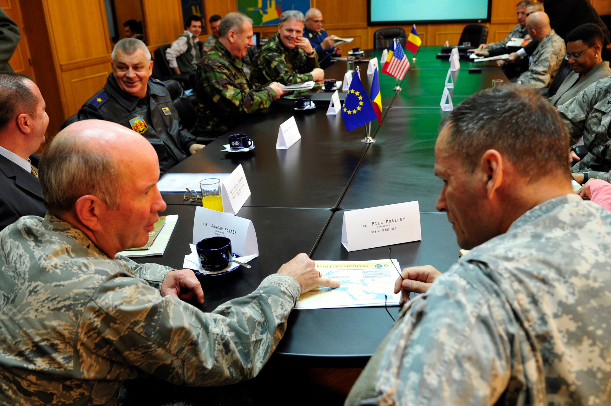 Air Force Gen. Duncan McNabb, U.S. Transportation Command commander and Army Col. Bill Moseley, 598th Transportation Brigade commander discuss the capabilities of the Port of Constanta, Romania during a visit there May 12.  While in
Romania, General McNabb visited both Mihail Kogalniceanu airport and the
Port of Constanta.  USTRANSCOM is evaluating the feasibility of using the
airport and seaport as a multi-modal hub for equipment flowing into and out
of the U.S. Central Command theater of operation.  (U.S. Air Force photo by
Master Sgt. Laura K. Deckman/released)