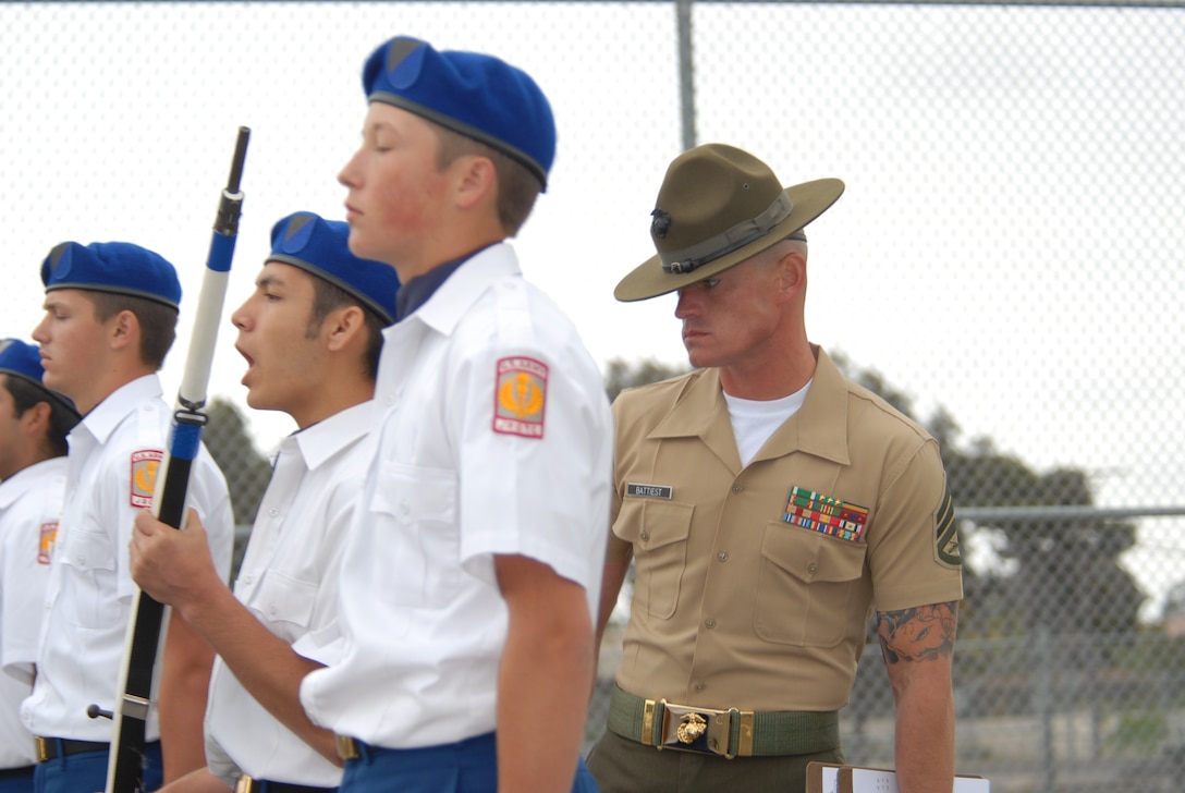 Marines from Marine Corps::r::::n::Recruit Depot San Diego were::r::::n::head inspectors May 14, during::r::::n::the San Diego Unified School::r::::n::District’s Junior Reserve Officer::r::::n::Training Corps’ final drill::r::::n::competition at Kearney High::r::::n::School.