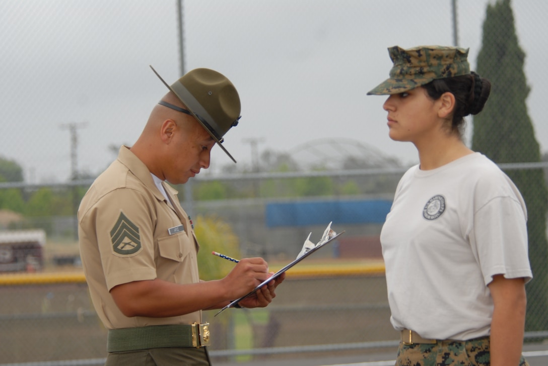 Marines from Marine Corps::r::::n::Recruit Depot San Diego were::r::::n::head inspectors May 14, during::r::::n::the San Diego Unified School::r::::n::District’s Junior Reserve Officer::r::::n::Training Corps’ final drill::r::::n::competition at Kearney High::r::::n::School.