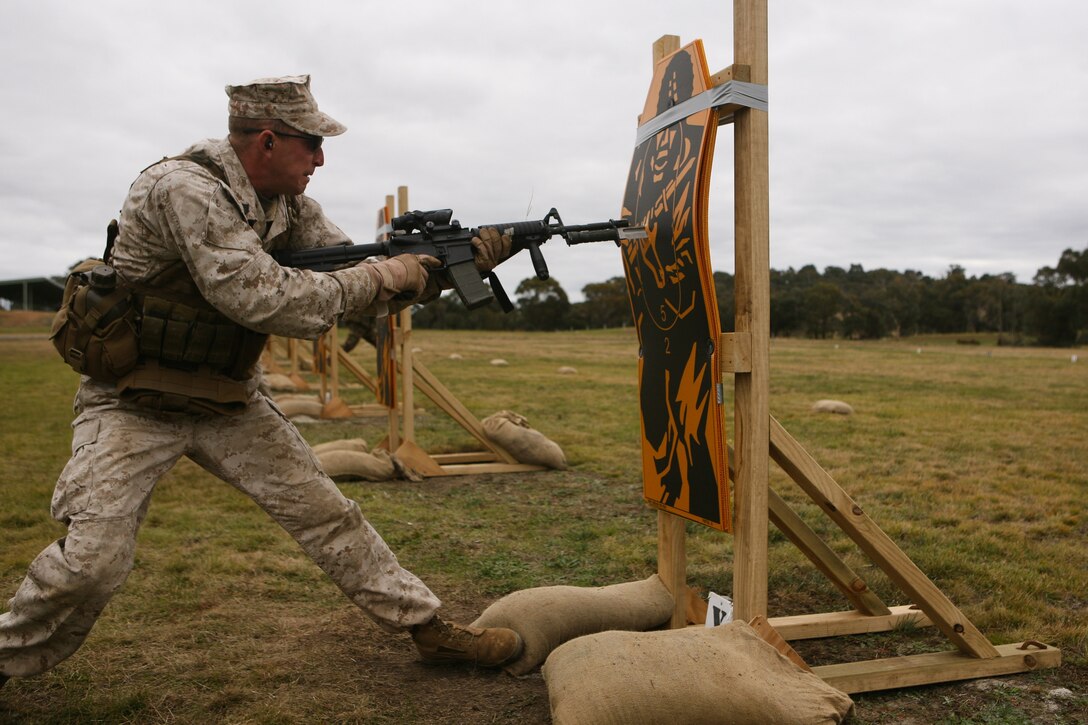Sgt. Matthew Gullete, competitor, Combat Shooting Team, Weapons Training Battalion, Marine Corps Base Quantico, bayonets a target here May 15 during the 2011 Australian Army Skill at Arms Meeting. The week-long meeting pit military representatives from partner nations in competition in a series of grueling combat marksmanship events. Represented nations include Canada, France (French Forces New Caledonia), Indonesia, Timor Leste, Brunei, Netherlands, U.S., Papua New Guinea, New Zealand, Singapore, Malaysia, Thailand as well as a contingent of Japanese observers. (U.S. Marine Corps Photo by Lance Cpl. Mark W. Stroud/Released)