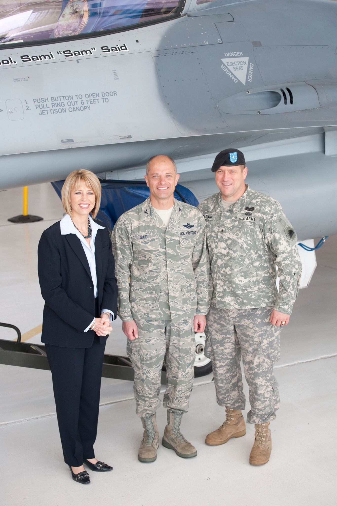 Fresno Mayor, Ashley Swearengin (left), joined the new Wing Commander and Brig. Gen. David S. Baldwin (right), The Adjutant General, California National Guard, after a recent Change of Command Ceremony held in Fresno, Calif. on May 14, 2011. The Mayor congratulated Col. Sami D. Said on his new position as the 144th Fighter Wing Commander.   (U.S. Air Force photo by Master Sgt. David Loeffler/released)