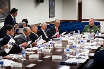 YOKOTA AIR BASE, Japan -- Col. Otto Feather, 374th Airlift Wing commander, listens to presentations from each of the local friendship clubs at the 374th AW conference room, Yokota Air Base, Japan, May 10, 2011. The clubs met with base leadership to recap the past year's events and strengthen bonds between the base and local communities. (U.S. Air Force photo/Staff Sgt. Samuel Morse)