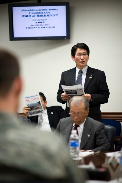 YOKOTA AIR BASE, Japan -- Shigeaki Takahashi, Musashimurayama-Yokota Friendship Club vice president, gives a presentation at the 374th Airlift Wing conference room, Yokota Air Base, Japan, May 10, 2011. The clubs met with base leadership to recap the past year's events and strengthen bonds between the base and local communities. (U.S. Air Force photo/Staff Sgt. Samuel Morse)