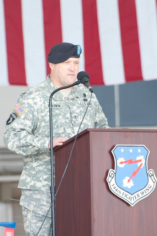 Brig. Gen. David S. Baldwin, The Adjutant General, California National Guard, speaks in front of the 144th Fighter Wing during a recent Change of Command Ceremony held in Fresno, Calif. on May 14, 2011.  The ceremony allows the unit to witness their new leader, Col. Sami D. Said, assume his dutiful position as the Wing Commander.  (U.S. Air Force photo by Master Sgt. David Loeffler/released)
