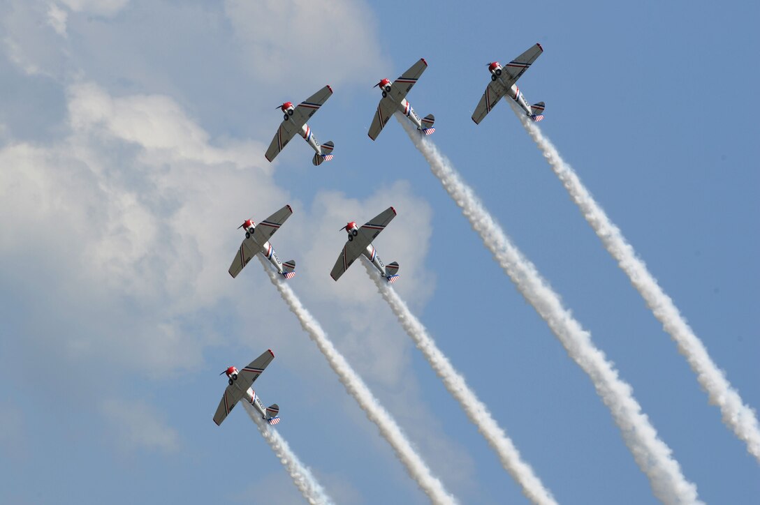 The GEICO Skytypers showcase their maneuverability during the AirPower over Hampton Roads open house at Langley Air Force Base, Va., May 15, 2011. The open house gives military and civilian personnel the opportunity to view various aircraft used by the military that they would not otherwise have the chance to experience.  (U.S. Air Force photo by Airman 1st Class Racheal Watson)(RELEASED)