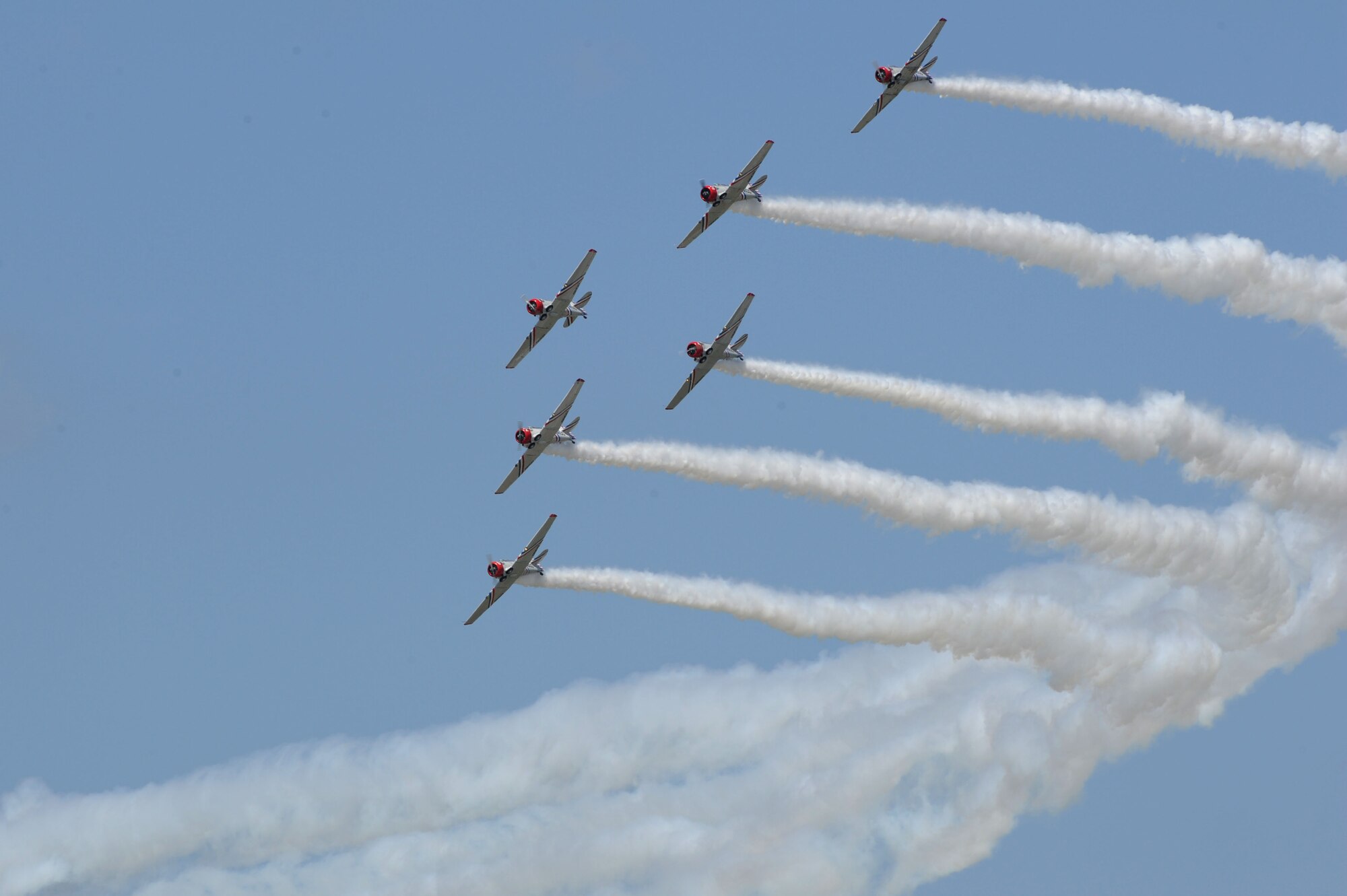 The GEICO Skytypers demonstrate their flying capabilities during the open house at Langley Air Force Base, Va., May 15, 2011. Joint Base Langley-Eustis’ AirPower over Hampton Roads open house provides an avenue in which the public can see modern and historical military aircraft in action.  (U.S. Air Force photo by Airman 1st Class Racheal Watson)(RELEASED)