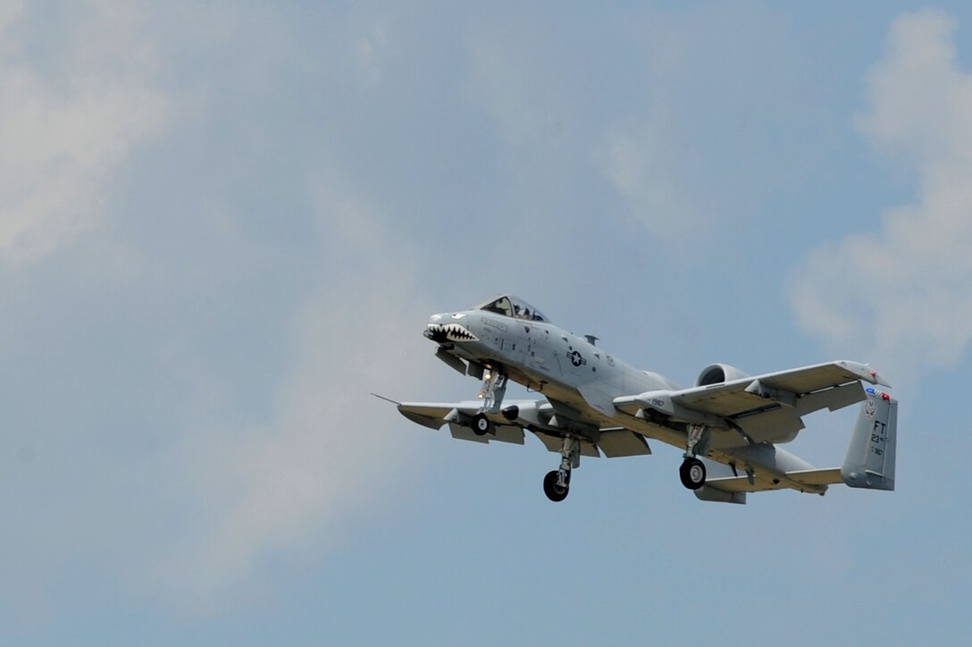 Maj. Dylan Thorpe, A-10 East Demonstration Team flying officer, performs during the open house with an A-10 Thunderbolt II at Langley Air Force Base, Va., May 15, 2011. The AirPower over Hampton Roads open house provides a free venue in which the public can see modern and historical military aircraft and civilian performers in action. (U.S. Air Force photo by Airman 1st Class Racheal Watson)(RELEASED)