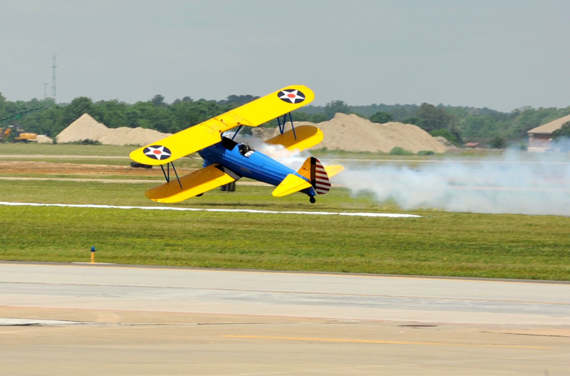 John Mohr, 1943 Stock Stearman PT-17 pilot, performs a “grace” maneuver during the AirPower over Hampton Roads open house at Langley Air Force Base, Va., May 14, 2011. The open house educates the public on past and present military aerial capabilities, increases recruiting and shows appreciation to the local community. (U.S. Air Force photo by Airman 1st Class Camilla Griffin)(RELEASED)