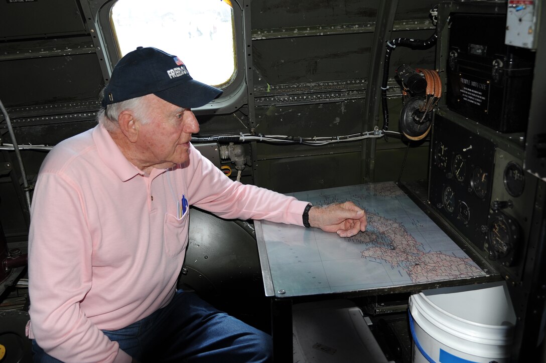 A. Kenneth Scribner Jr., retired B-29 navigator, sits in the navigation seat of the B-29 “FiFi” during Joint Base Langley-Eustis’ AirPower over Hampton Roads open house at Langley Air Force Base, Va., May 15, 2011. The Joint Base Langley-Eustis air show showcased the Air Force’s past and present capabilities in air power.  (U.S. Air Force photo by Airman 1st Class Teresa Zimmerman)(RELEASED)