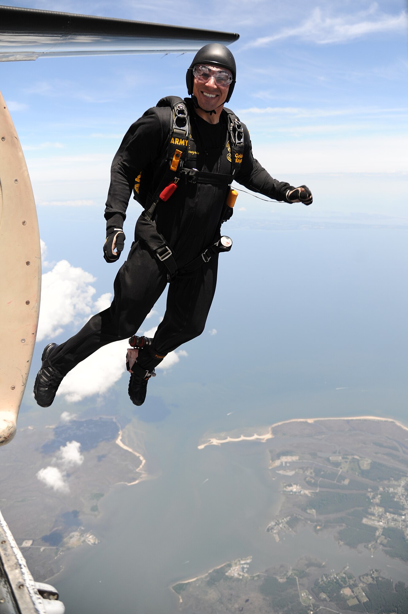 Army Sgt. 1st Class Dustin Peregrin, U.S. Army Golden Knights Parachute Team parachutist, jumps out of a C-31A Friendship Fokker during Joint Base Langley-Eustis’ AirPower over Hampton Roads open house at Langley Air Force Base, Va., May 15, 2011. The Golden Knights have been wowing audiences at air shows, competitions, and high profile tandems for 50 years. (U.S. Air Force photo by Airman 1st Class Teresa Zimmerman)(RELEASED)