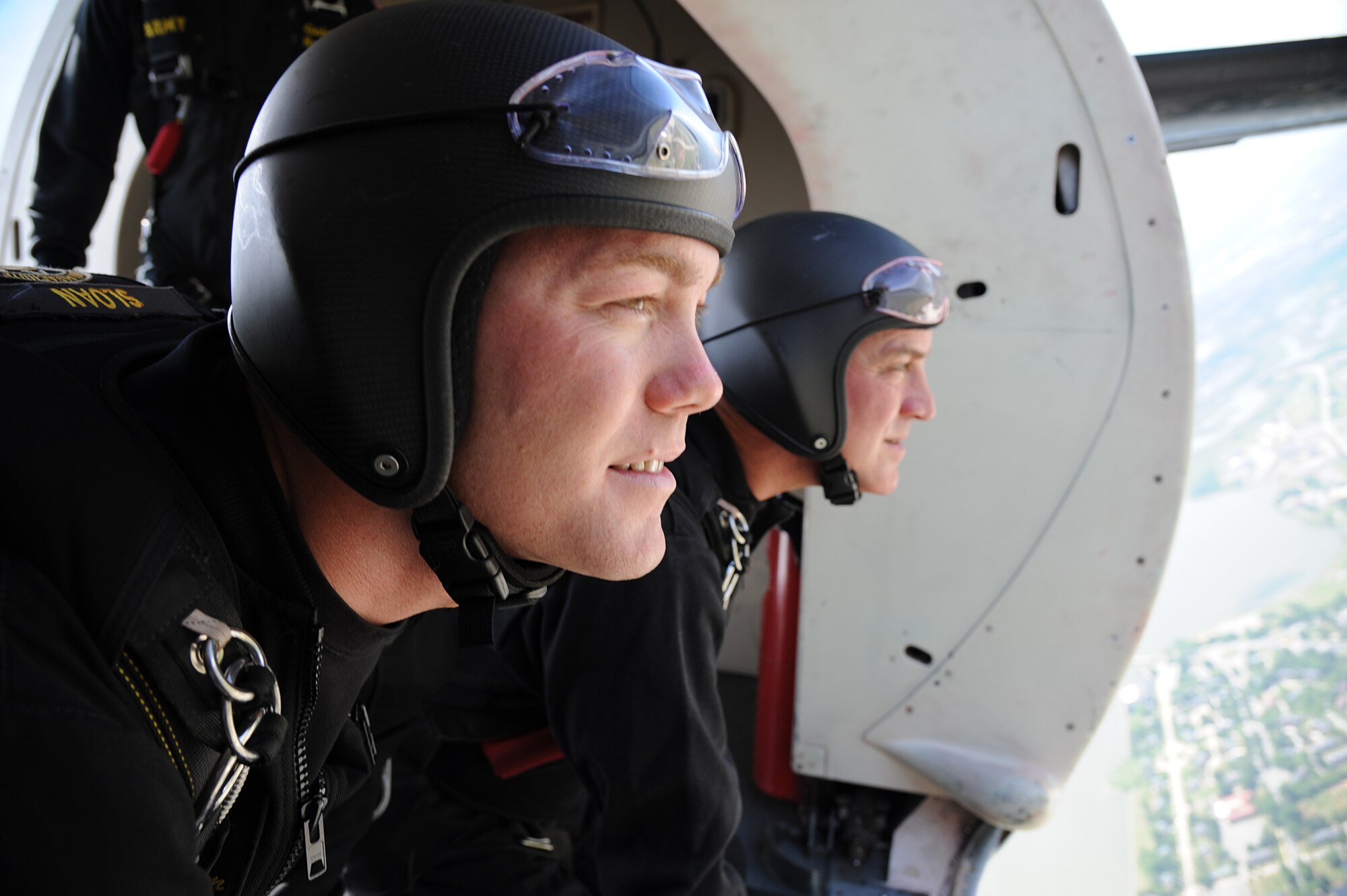 Army Sgt. Richard Sloan, U.S. Army Golden Knight Parachute Team parachutist, and Sgt. 1st Class J.D. Berentis team leader, observe wind speeds before jumping out of a C-31A Friendship Fokker during Joint Base Langley-Eustis’ AirPower over Hampton Roads open house at Langley Air Force Base, Va., May 15, 2011. The Golden Knights are among the most formidable parachuting competitors and demonstrators in the world today. (U.S. Air Force photo by Airman 1st Class Teresa Zimmerman)(RELEASED)