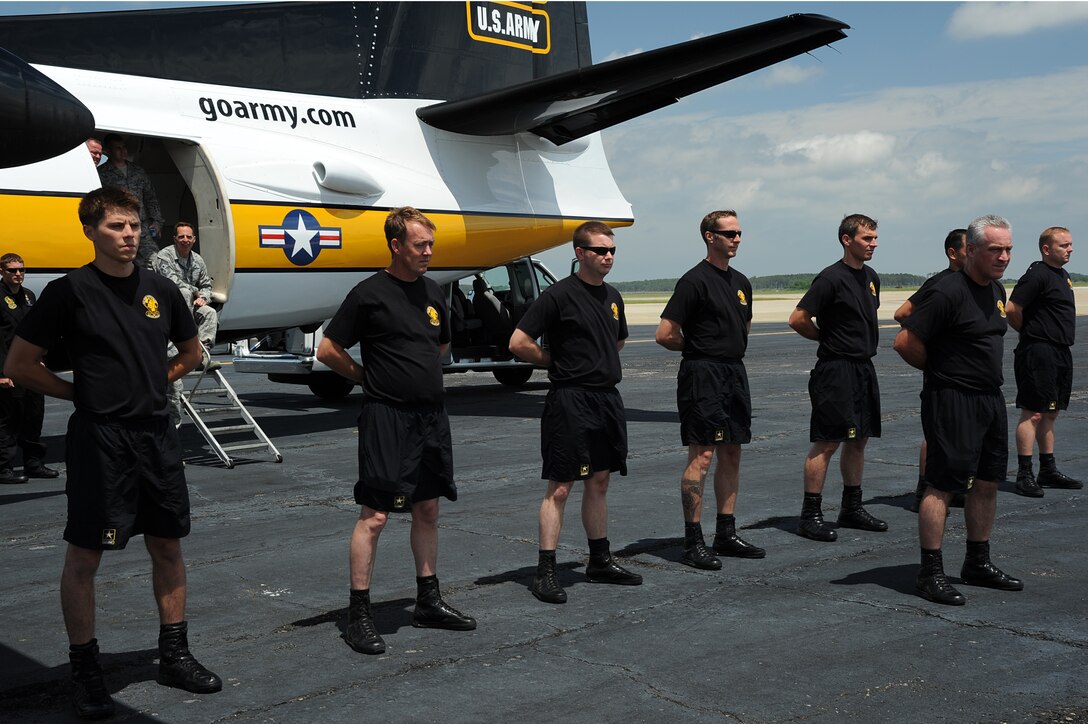 The U.S. Army Golden Knights Parachute Team prepares for flight during Joint Base Langley-Eustis’ AirPower over Hampton Roads open house at Langley Air Force Base, Va., May 15, 2011. The Golden Knights have been wowing audiences at air shows, competitions, and high profile tandems for 50 years. (U.S. Air Force photo by Airman 1st Class Teresa Zimmerman)(RELEASED)