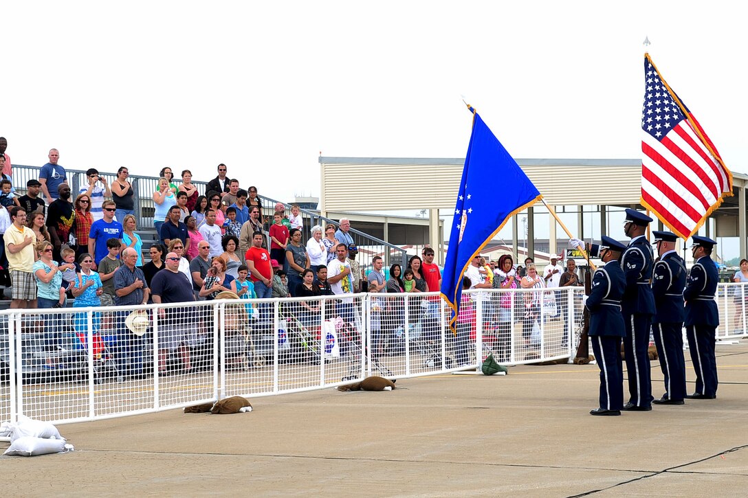 The Langley Honor Guard posts the colors for the National Anthem during the AirPower over Hampton Roads open house at Langley Air Force Base, Va., May 15, 2011. The open house helps to educate the public about Air Force capabilities and shows appreciation to the local community. (U.S. Air Force photo by Staff Sgt. Ashley Hawkins)(RELEASED)