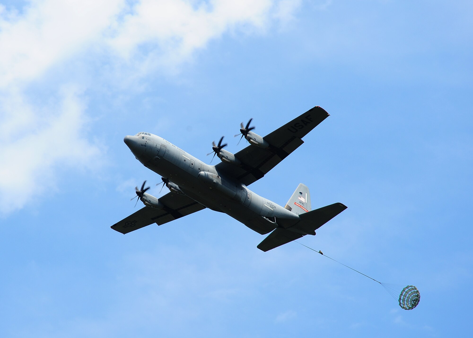 An 815th Airlift Squadron C130J-30 "Flying Jenny" prepares to drop a G-12 equipment parachute. (U.S. Air Force photo by Staff. Sgt Yolanda Addison)