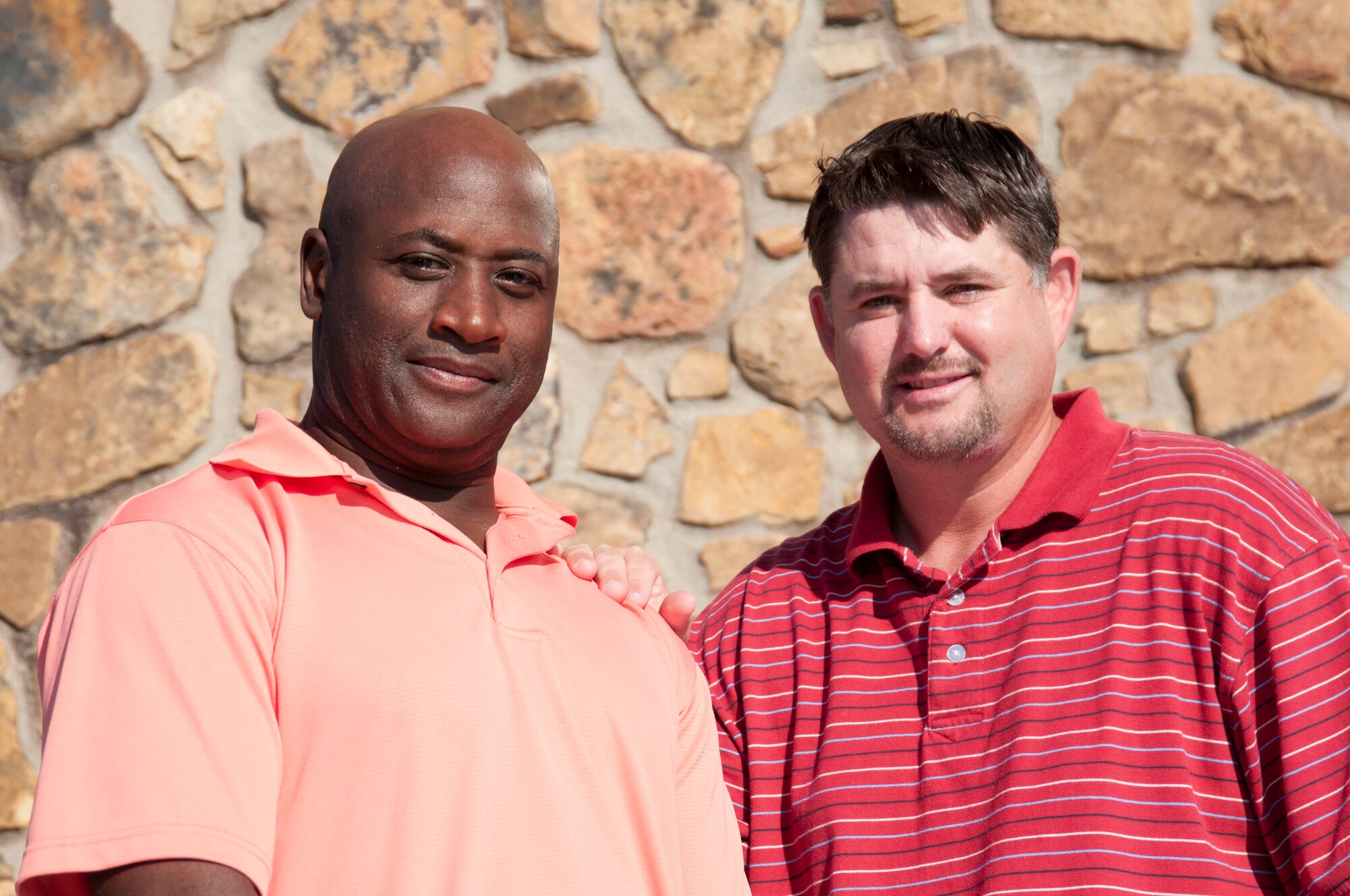 Mr. Cecil Goodloe (left), a fomer Marine family readiness officer, was recently appointed Yellow Ribbon Support Program coordinator for the Kentucky Air National Guard 123rd Airlift Wing, Louisville. Mr. Goodloe will work closely with Mr. Dave Rooney (right), 123rd Family Support Program director, to ensure families and members are connected with needed resources before, during and after deployments. (U.S. Air Force photo by Tech. Sgt. D. Clare)
