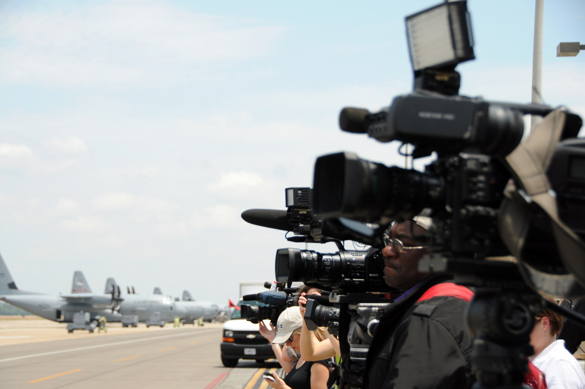 The media lines up on the flightline to watch a C-130J take off. The 403rd hosted media day and invited the outlets to come and get familiar with the hurricane mission before the season picks up. They were able to meet some of the aircrew and ride along on a training mission. (U.S. Air Force Photo by Staff Sgt. Tabitha Dupas) 