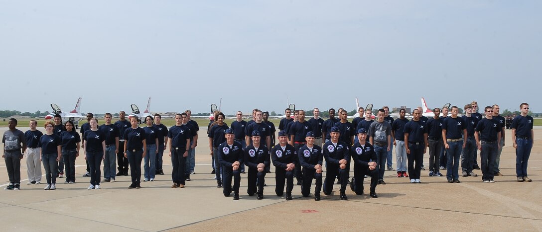 Pilots for the U.S. Air Force Demonstration Squadron, the Thunderbirds, pose for a photo with 45 of Hampton Roads’ newest members of the Air Force Delayed Entry Program at Langley Air Force Base, Va., May 14, 2011. The recruits accepted the call to service during the Joint Base Langley-Eustis Airpower over Hampton Roads open house. (U.S. Air Force photo/Senior Airman Antoinette Gibson) (RELEASED)