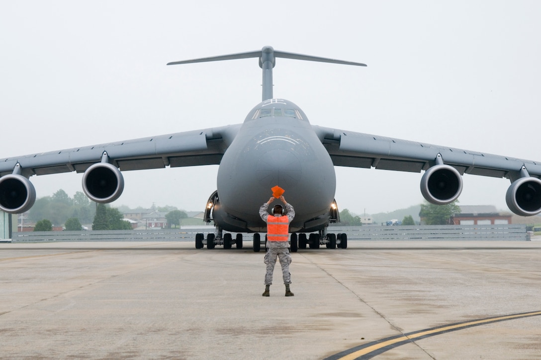 A C-5M aircraft assigned to Dover Air Force Base is parked at the 167th Airlift Wing, West Virginia Air National Guard in Martinsburg, WV on May 14, 2011. The 167th AW currently operates C5A aircraft. 167th AW aircraft operators and maintainers toured the C-5M which boasts the ability to fly faster, higher and longer with reduced engine noise, than the C-5A and C-5B models. (U.S. Air Force photo by Master Sgt. Emily Beightol-Deyerle)