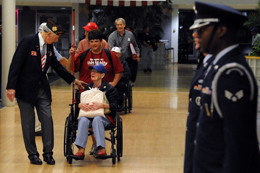 Dorothy Kneipp, World War II veteran, is greeted by Kenneth Koval, State Commander of Post 5951 Louisiana Veteran of Foreign Wars, at the Shreveport Regional Airport in Shreveport, La., May 12. The veterans visited the capital to see the World War II monument for the first time. Barksdale and the local community welcomed the veterans home to show support and gratitude. (U.S. Air Force photo/Airman 1st Class Micaiah Anthony)(RELEASED)