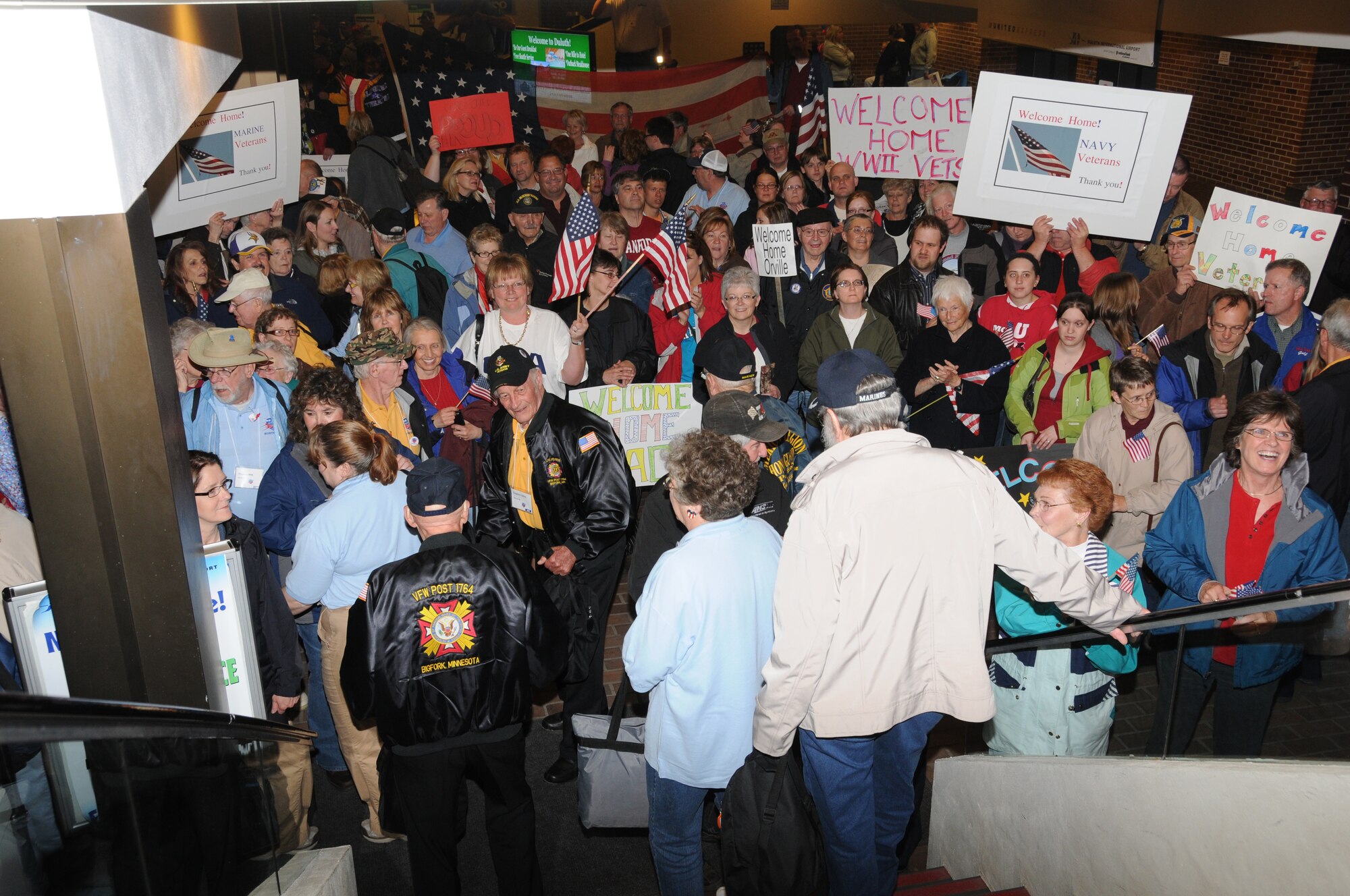 World War II veterans receive a heroes welcome at the Duluth International Airport, Duluth, Minn.  The veterans spent the day touring Washington D.C. to include visiting  the World War II memorial.  (U.S. Air Force photo by Master Sgt. Ralph J. Kapustka)