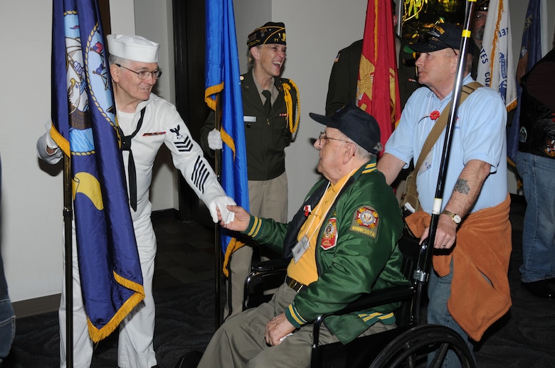 A World War II veteran is seen receiving appreciation for his service before departing the Duluth International Airport, Duluth, Minn.  The veteran was waiting to board an aircraft going to Washington D.C. as part of the Northland Honor Flight.  (U.S. Air Force photo by Master Sgt. Ralph J. Kapustka)