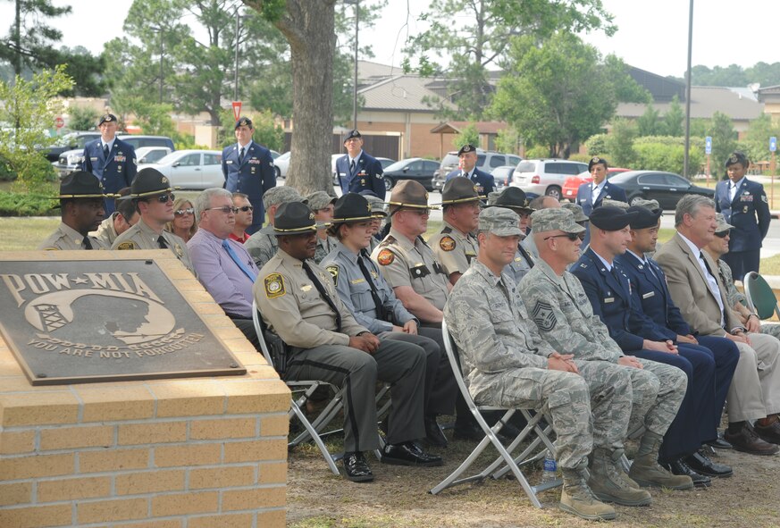 A crowd of military and civilian law enforcement personnel sit in attendance during a National Police Week Retreat Ceremony May 13 at Moody Air Force Base, Ga. Guests from the Cook and Lowndes County Sheriff’s Departments and Valdosta Police Department took part in the ceremony. (U.S. Air Force photo/Airman 1st Class Paul Francis)(RELEASED)