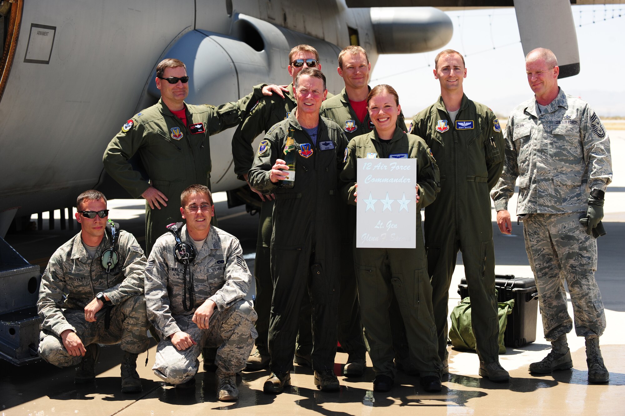 DAVIS-MONTHAN AIR FORCE BASE, Az. -- Lt. Gen. Glenn F. Spears, 12th Air Force commander, celebrates with members of the 42nd Electronic Combat Squadron after his fini flight here on May 6. General Spears served more than 33 years in the Air Force and was a command pilot with more than 3,400 flying hours in 16 types of aircraft. (Air Force photo by Senior Airman Jerilyn Quintanilla, 355th Fighter Wing Public Affairs)