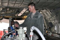 NAVAL AIR STATION NORTH ISLAND, Calif. -- Maintenance crews from the 910th Airlift Wing, based at Youngstown Air Reserve Station, Ohio, are prepping wing aircraft to participate in a multi-agency oil spill exercise in San Diego, May 11-12, 2011. Air Force Reserve Tech. Sgt. Tom Neiswanger, an aerial spray maintainer assigned to the 910th Aircraft Maintenance Squadron, checks the float mechanism of a Modular Aerial Spray System on the cargo deck of a C-130H Hercules cargo aircraft on the flight line here, May 11, 2011. The 910th AW operates the Department of Defense's only large-area, fixed wing aerial spray capability. The 910th citizen Airmen returned to YARS on May 13, 2011. U.S. Air Force photo by Master Sgt. Bob Barko Jr.
