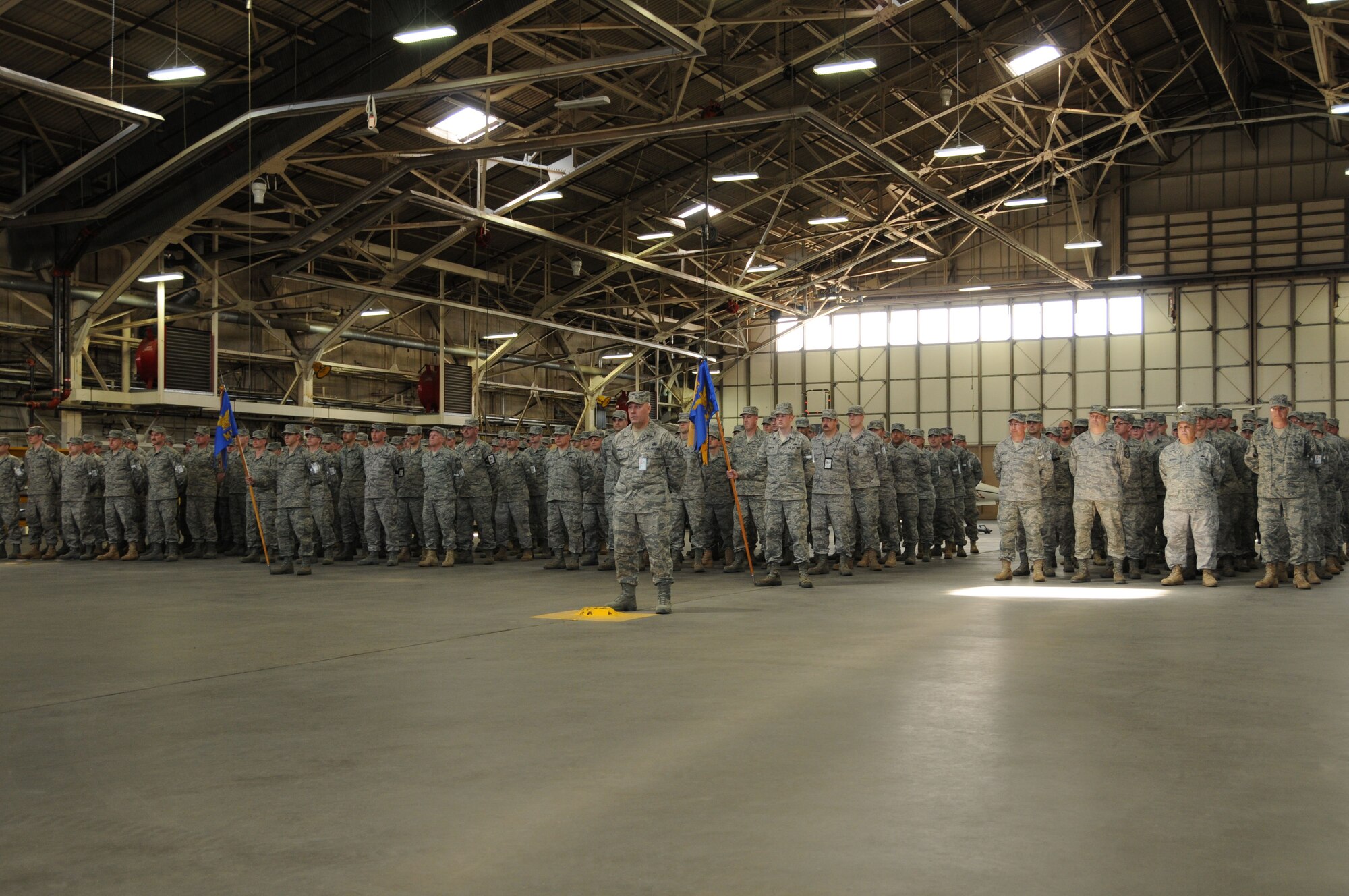 Members of the 103rd Maintenance Group, Connecticut Air National Guard, stand in formation during the annual maintenance group awards ceremony at Bradley Air National Guard Base, East Granby, Conn., April 17, 2011. Awards were given in recognition of the multiple accomplishments of the 103rd Maintenance group members during 2010. (U.S. Air Force photo by Tech. Sgt. Tedd Andrews)