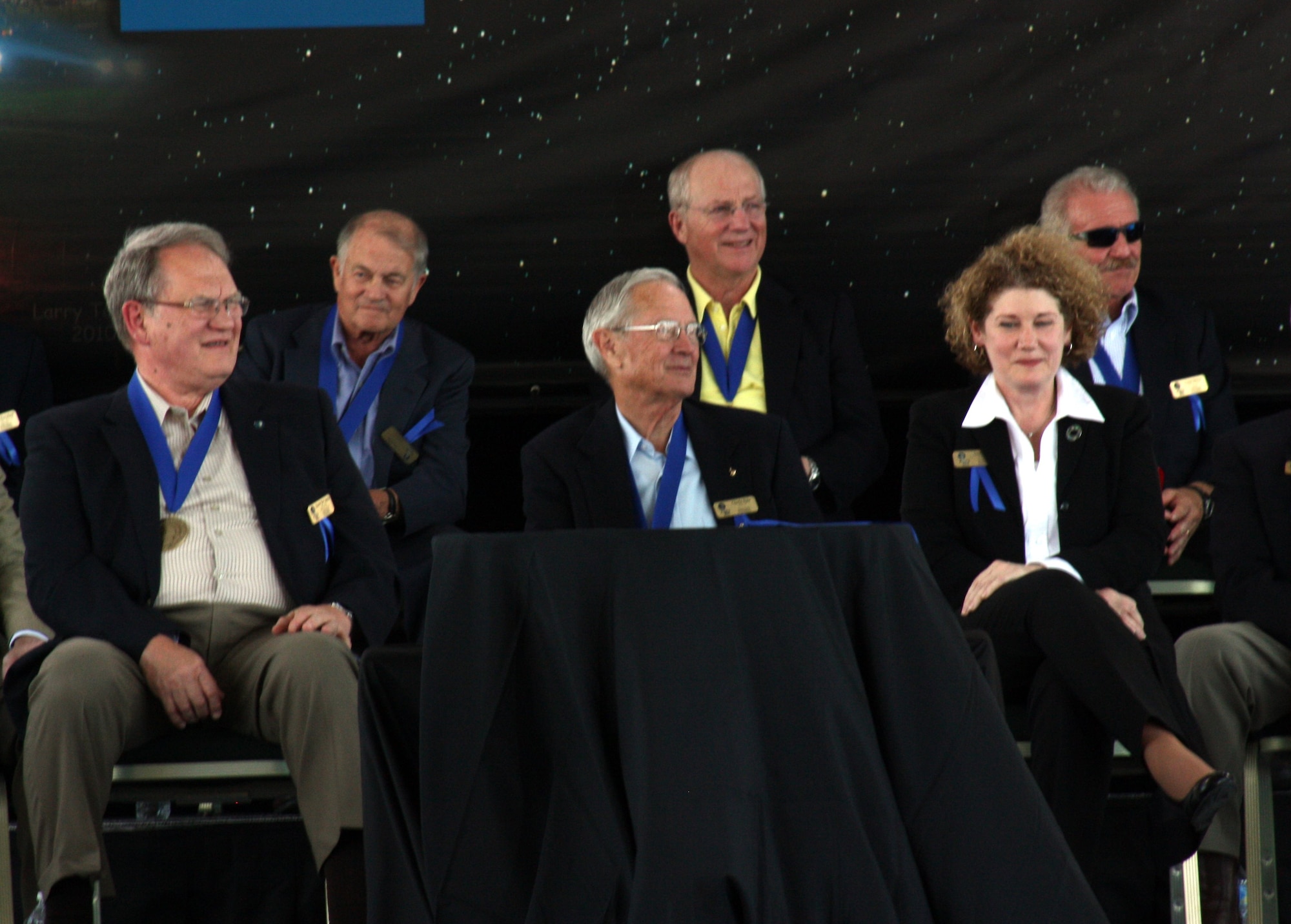 Retired Col. Karol Bobko (left) and Lt. Gen. Susan Helms (right) sit among fellow members of the U.S. Astronaut Hall of Fame May 14, 2011, at Kennedy Space Center, Fla. General Helms is the 14th Air Force commander. (Courtesy photo)