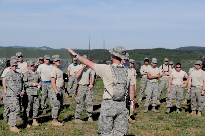 GEROLSTEIN, Germany – Maj. John McCann, 606th Air Control Squadron chief of maintenance, gives a briefing about the day’s events to Airmen from the 606th ACS during exercise Eifel Thunder 2011 in Gerolstein, Germany, May 9. The exercise tested the ability of Airmen to take all their equipment to an isolated location where they set up a deployed radar and satellite communications site as well as everything else required to survive and accomplish the mission in an isolated environment. (U.S. Air Force photo/Senior Airman Nick Wilson)