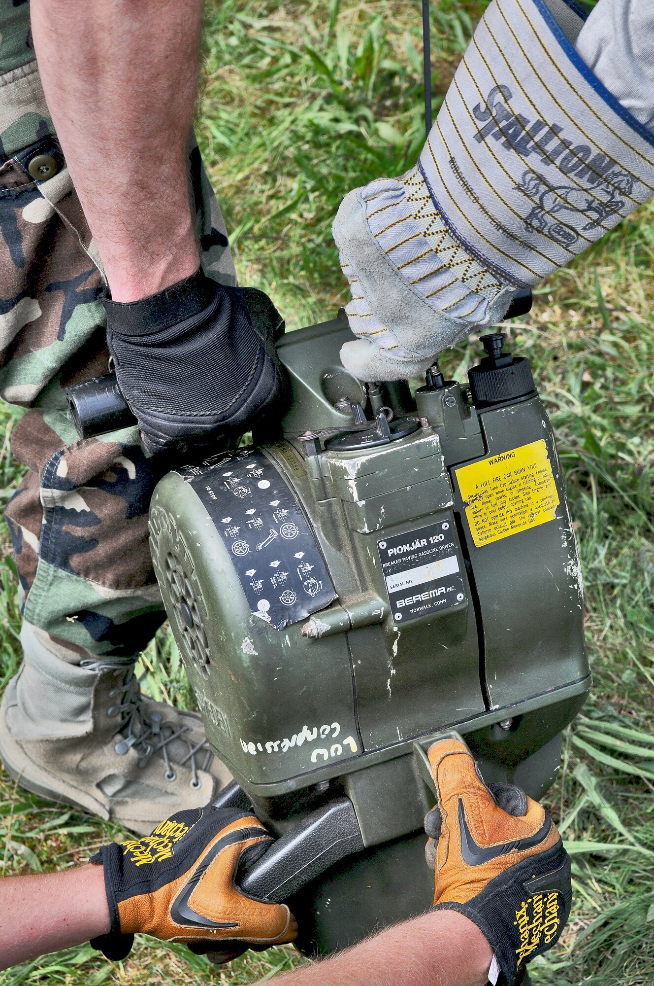 GEROLSTEIN, Germany – Airmen from the 606th Air Control Squadron, use a Pionjar 120 jackhammer to anchor an antenna in the ground to prevent it from falling over as part of exercise Eifel Thunder 2011 in Gerolstein, Germany, May 9. The exercise tested the ability of Airmen to take all their equipment to an isolated location where they set up a deployed radar and satellite communications site as well as everything else required to survive and accomplish the mission in an isolated environment. (U.S. Air Force photo/Senior Airman Nick Wilson)