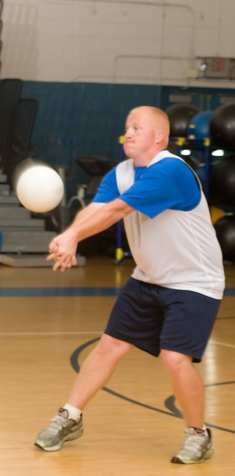 Chance Wisdom, 736th Aircraft Maintenance Squadron, passes a volleyball during the volleyball championship game May 11, 2011, at the Dover Air Force Base, Del., Fitness Center. The 736 AMXS team was victorious in the championship 15-10 over the 436th Logisticss Readiness Squadron. (U.S. Air Force photo by Airman 1st Class Matthew Hubby)