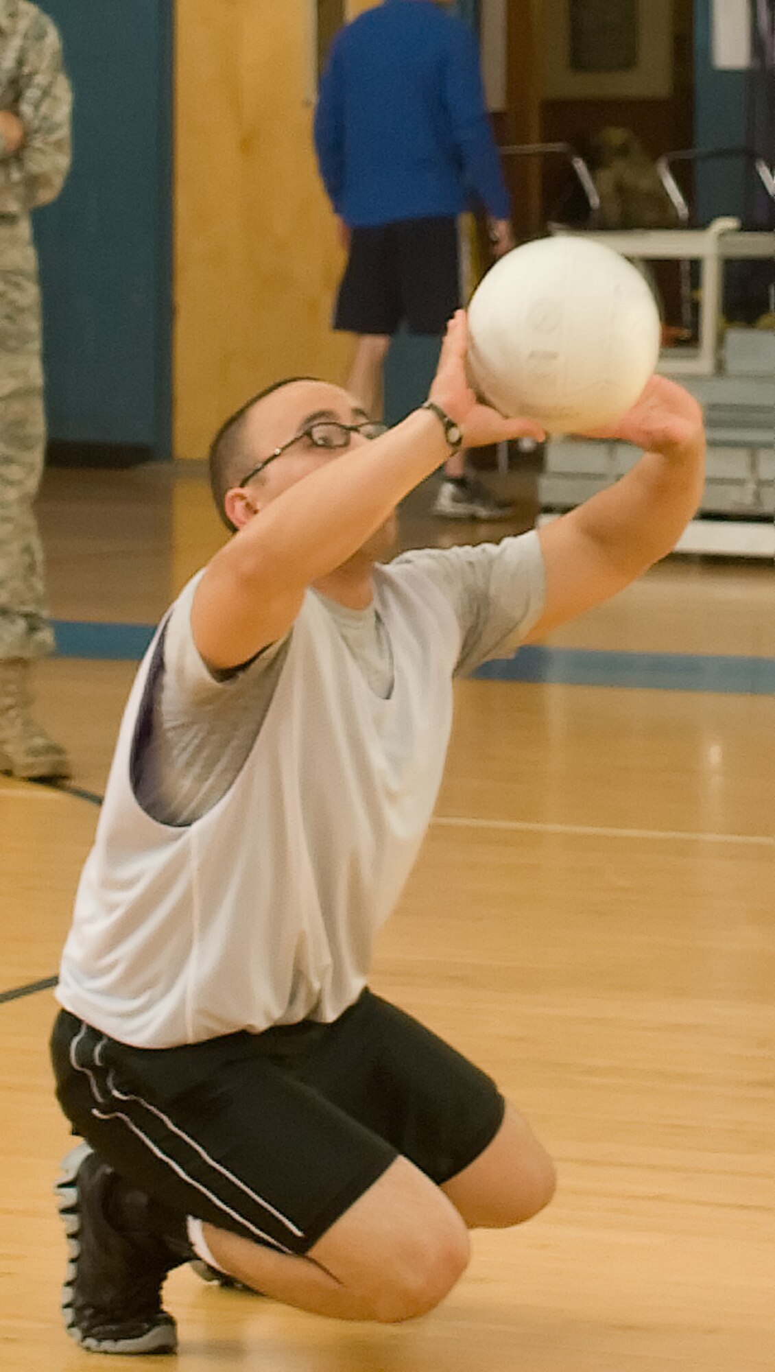 Zomora Diego, 436th Logistics Readiness Squadron, sets a volleyball during the volleyball championship game May 11, 2011, at the Dover Air Force Base, Del., Fitness Center. The 436 LRS team lost their first game, but turned it around in the second, only to be defeated 10-15 in the final match by the 736th Aircraft Maintenance Squadron. (U.S. Air Force photo by Airman 1st Class Matthew Hubby)