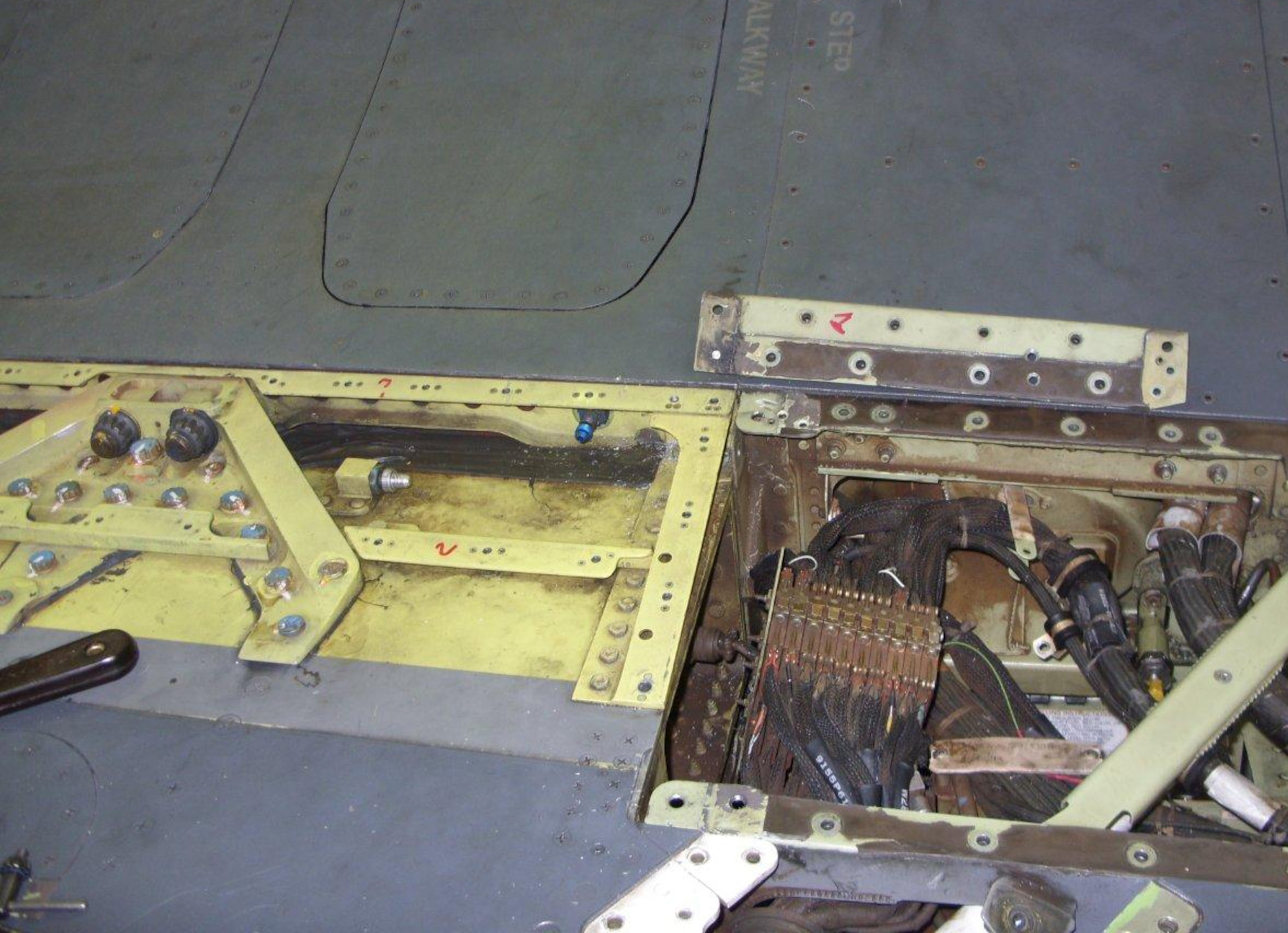SPANGDAHLEM AIR BASE, Germany – An F-16 Fighting Falcon’s wing lies exposed as part of a new process to replace the root bracket. The 52nd Equipment Maintenance Squadron Fabrication Flight Aircraft Structures Maintenance Shop recently began a new process for replacing root brackets on F-16 wings. The process reduces the man hours it takes to perform the repair from 522 to 26 man hours. (Courtesy photo)