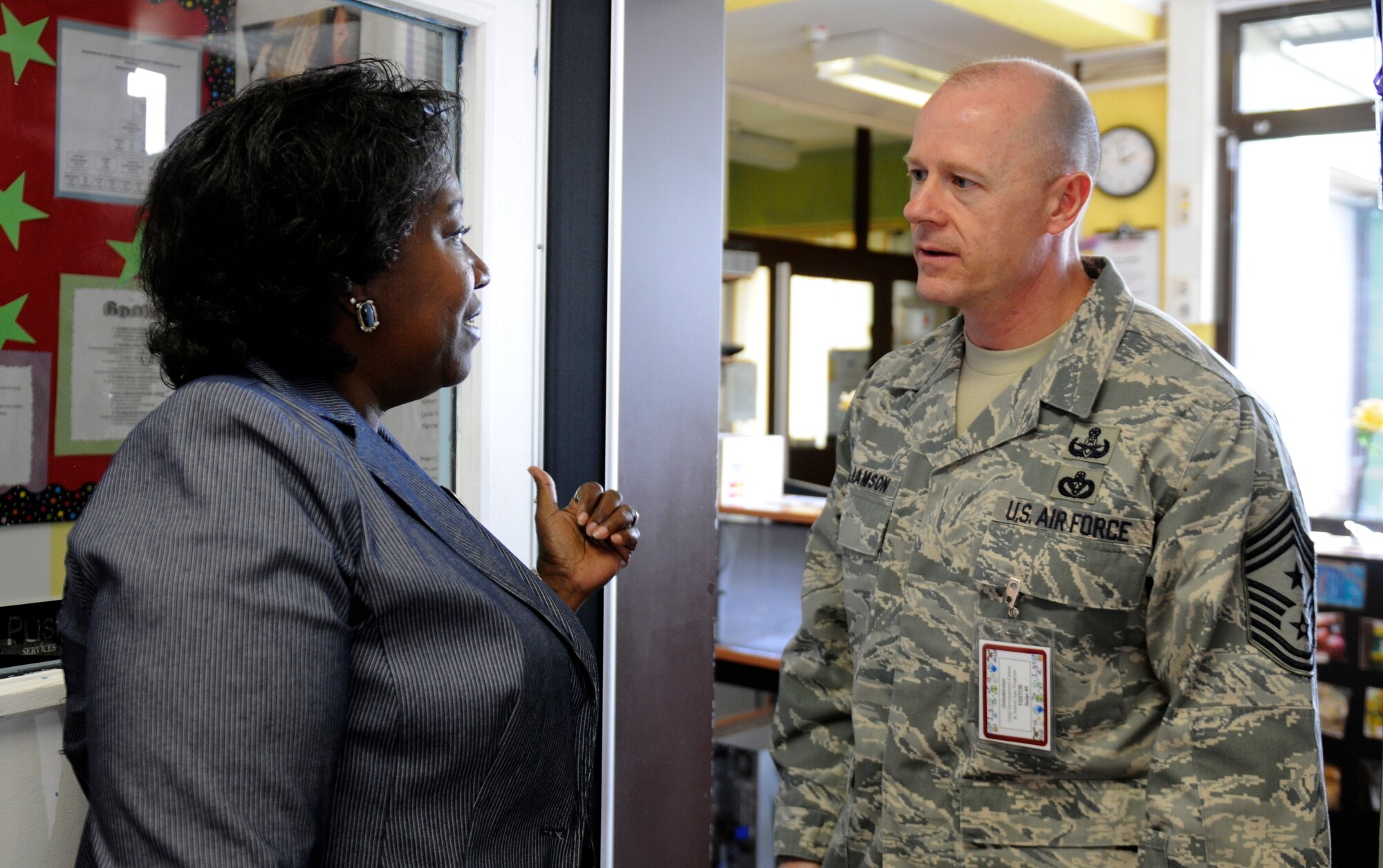 NATO AIR BASE GEILENKIRCHEN, Germany – Chief Master Sgt. David Williamson, U.S. Air Forces in Europe command chief, speaks with Sherrie Walker, child development center director, about the new expansion to the center here May 11. Chief Williamson visited various facilities at the NATO Air Base Geilenkirchen to gain a better understanding of the base’s mission and to observe mission resources. (U.S. Air Force photo/Airman 1st Class Brittney Frees)