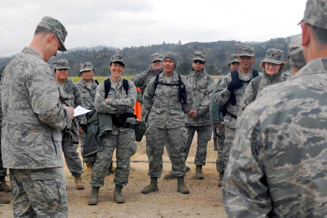 Air Force Lt. Col. Paul Schultz briefs members of Global Medic 2011 on Fort Hunter Liggett, Calif., May 14, 2011. Schultz is assigned to the 934th Airlift Wing based at Minneapolis-St. Paul Air Reserve Station, Minn. Global Medic is a joint field training exercise for theater aeromedical evacuation system and ground medical components designed to replicate all aspects of combat medical service support.