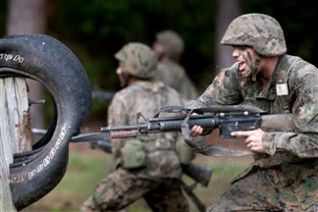 Marine recruits go through the bayonet assault training course at Parris Island, S.C., on May 13, 2011.  