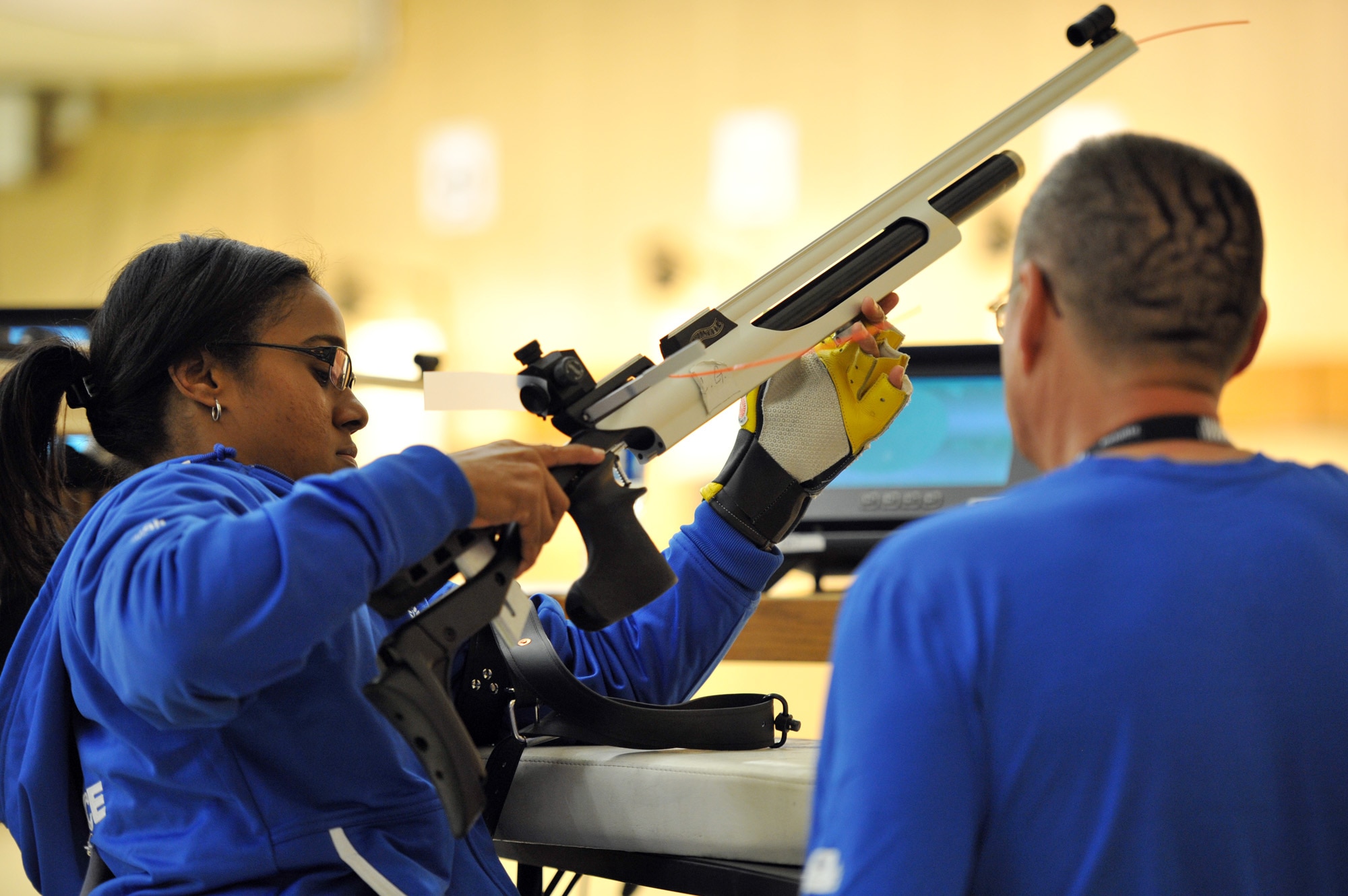Chatriex Goodson prepares to take aim in the shooting competition of the 2011 Warrior Games May 17, 2011, at the U.S. Olympic Training Center in Colorado Springs, Colo. More than 200 wounded warriors from all the military services are competing in Paralympic-style athletic events May 16 through 21. (U.S. Air Force photo/Staff Sgt. Desiree N. Palacios)

