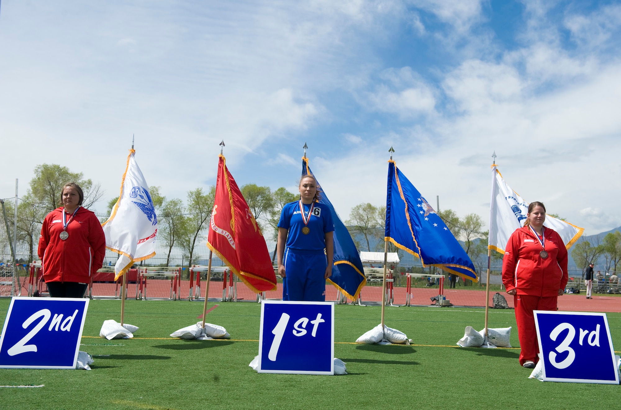 Air Force athlete Jennifer Stone receives a gold medal during the track and field competition May 17, 2011, at the 2011 Warrior Games in Colorado Springs, Colo.  The track and field events kicked off the games, which continue throughout the week. (U.S. Air Force photo/Staff Sergeant Christopher Griffin)